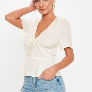 Pink twist peplum top